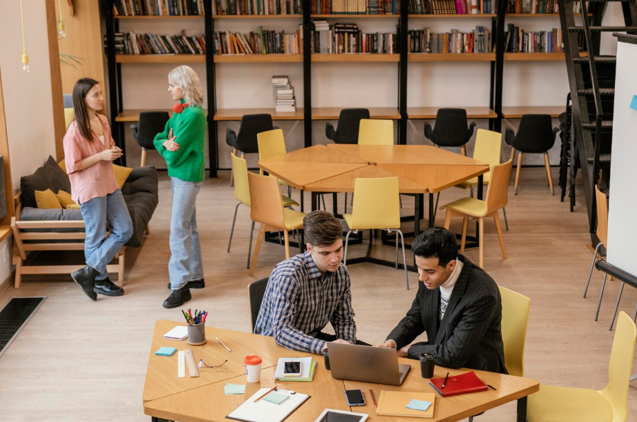 College students collaborating and chatting casually highlighting networking for introverts