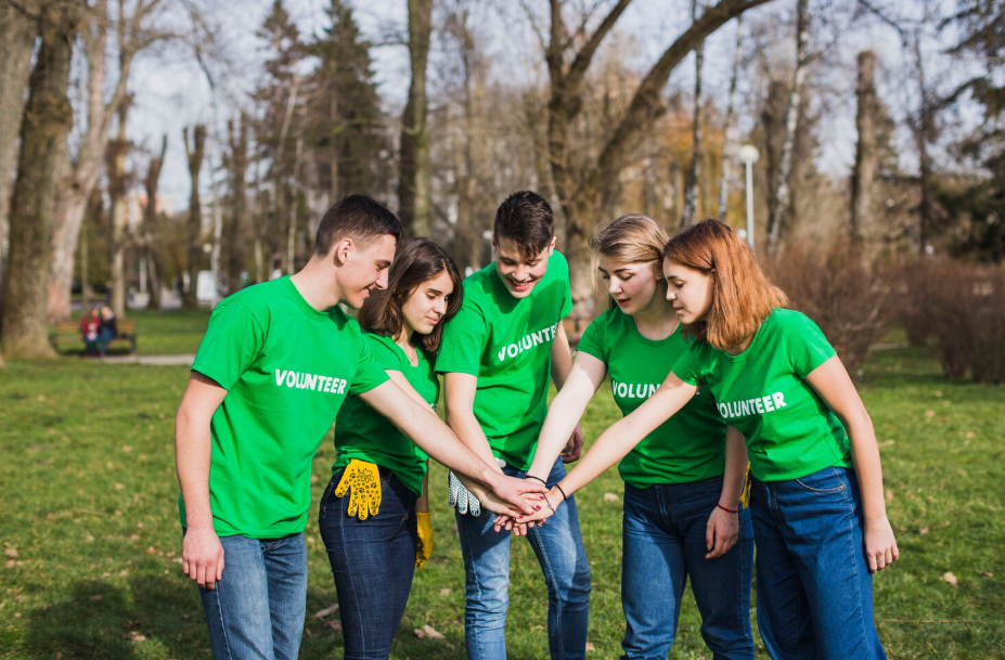 Group of young volunteers working together during gap year
