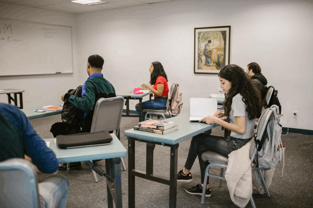 Community college students in small class highlighting personalized learning