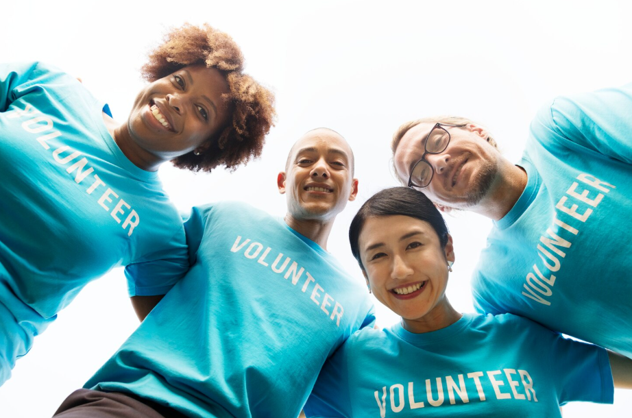 Group of student volunteers smiling and gaining skills for employment